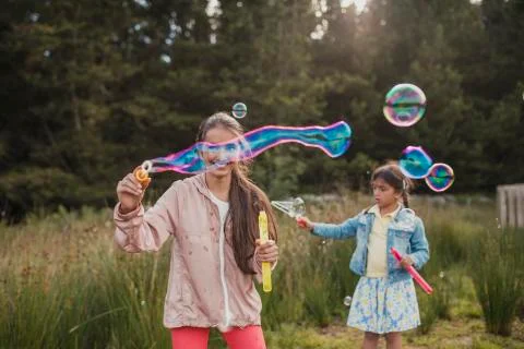 Girls Making Bubbles 스톡 사진