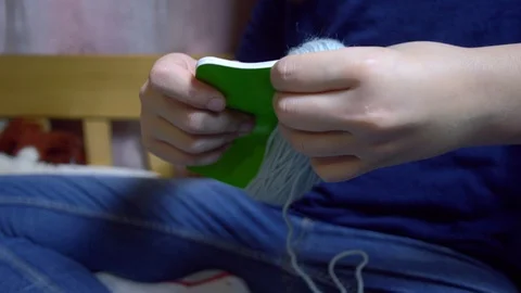 Girls making dolls from strings. Stock Footage 120558687