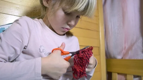 Girls making dolls from strings. Stock Footage 120560083