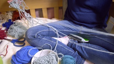 Girls making dolls from strings. Stock Footage 120561192