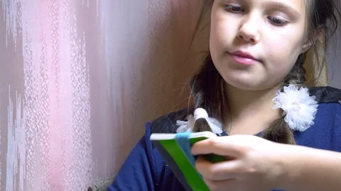 Girls making dolls from strings. Stock Footage 120562005