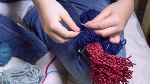 Girls making dolls from strings. Stock Footage 120563536