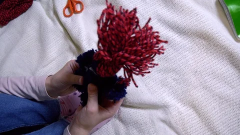 Girls making dolls from strings. Stock Footage 120567323