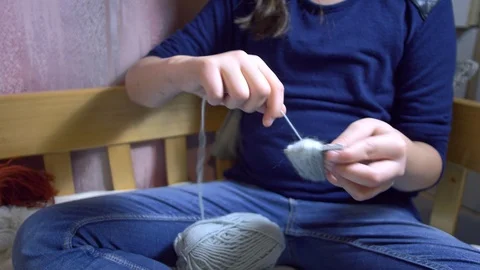 Girls making dolls from strings. Stock Footage 120734323