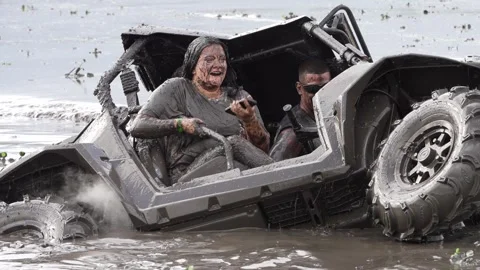 Girls in the mud pit with Side by side car sinking 2025 Stock Footage 302306185