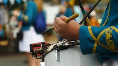 Girls play synchronously on drums. Close-up view Stock Footage