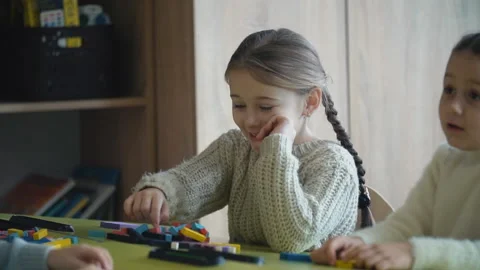 Girls playing with a constructor Stock Footage 102109063