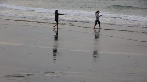 Girls playing on the ocean beach Stock Footage 59158136