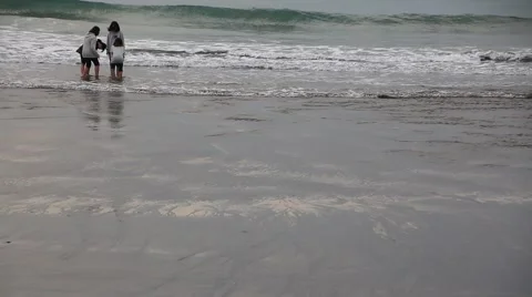 Girls playing on the ocean beach Stock Footage 59158291