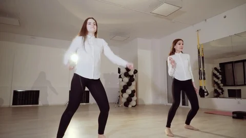 Girls rehearse dancing in the studio. Studio of dances. Stock Footage 89409848