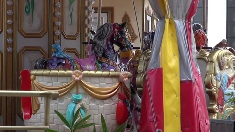 Girls ride on the carousel Stock-Footage 70621132