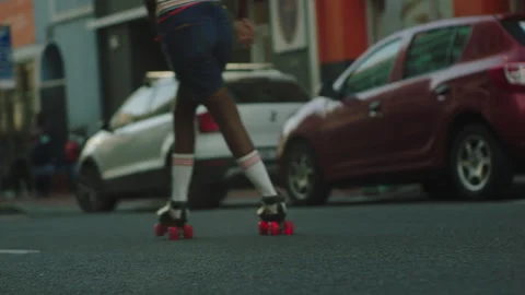 Girls rollerskating through the city Stock Footage 279381648