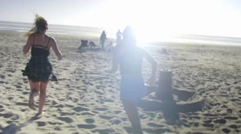 Girls run on beach Stock Footage 52745965