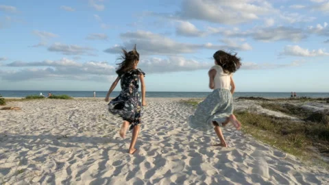 Girls Run to Beach Stock Footage 149602537