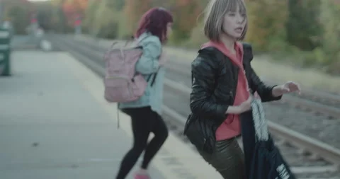 Girls Running down Train Tracks Stock Footage 223448626