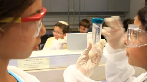 Girls in science lab class Stockbeeldmateriaal 25594417