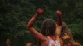 Girls sitting on boyfriends' shoulders at party, dancing crowd HD Footage