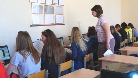 Girls students in a computer class with a teacher Video stock 107005208