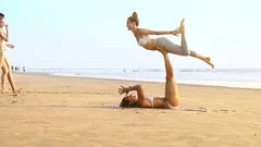 Slim Girls Start Do Couple Yoga Pose on , Stock Video