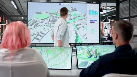 GIS Engineer Giving Digital Twin Maps Presentation Stock Footage 332902306