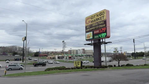 Git N Go Market gas price advertisement sign 4k Stock Footage 332992305