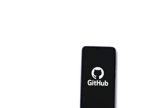 GitHub app launch screen with logo on the display of a black mobile smartphon Stock Photos