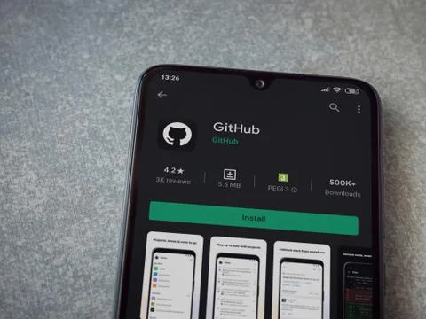 GitHub app play store page on the display of a black mobile smartphone on cer Foto stock