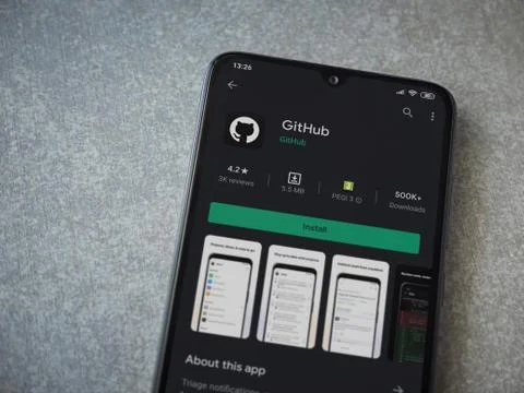 GitHub app play store page on the display of a black mobile smartphone on cer Foto stock