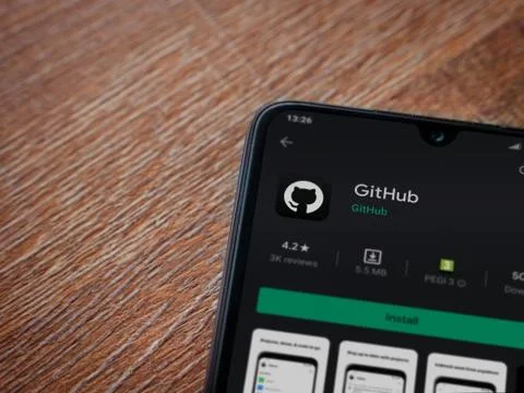 GitHub app play store page on the display of a black mobile smartphone on woo Фото
