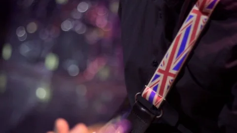 Gitraist plays the guitar Stock Footage 98223973