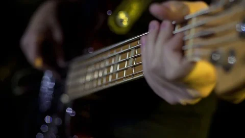 Gitraist plays the guitar Stock Footage 98224080