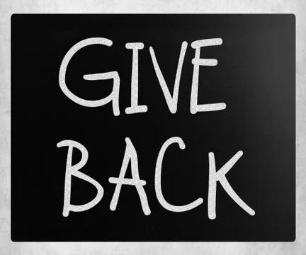 "give back" handwritten with white chalk on a blackboard Stock Illustration