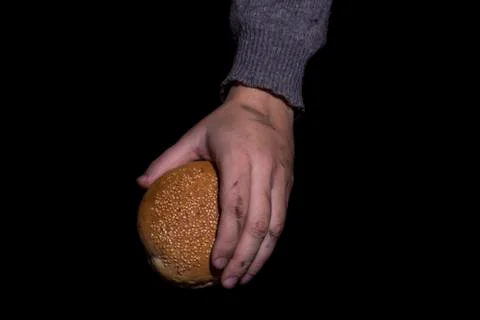 Giving bread. Poverty concept. Stock Photos