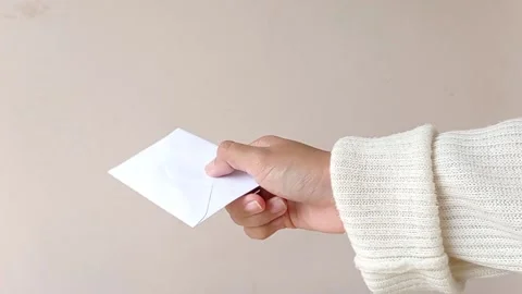 Giving an envelope to someone Stock Footage 151020972