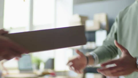Giving Parcel to Customer at Pickup Point Stock Footage 228493875