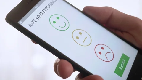 Giving a positive feedback on customer satisfaction app using smartphone Stock Footage 88899311