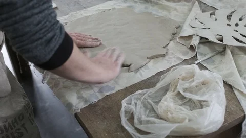 Giving the proper shape to the clay Stock Footage 88732758