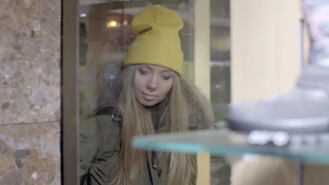 Giwl By the Shop Window Video stock 112751347