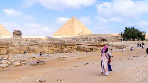 Giza pyramids and sphinx complex attracting tourists 스톡 사진