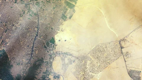 Giza Pyramids from Space. Elements of this video furnished by NASA. Vídeos de archivo 135349731