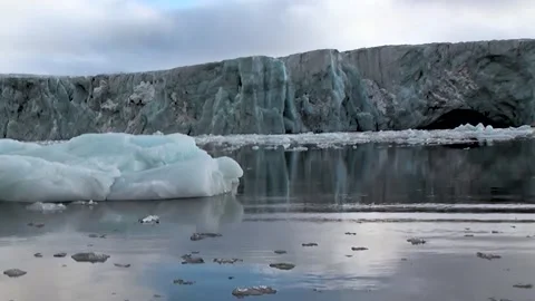 Glacial Blue Giants Drift Silently in the Arctic Sea Stock-Footage 344602916