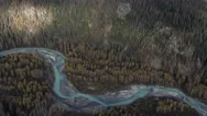 Glacial Blue River Snaking Magic Mountain Forest Aerial Stock Footage