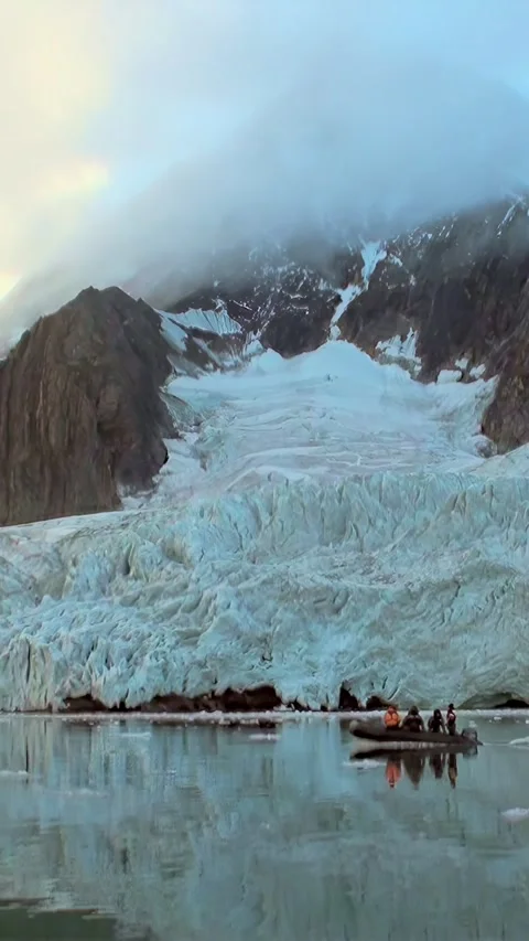 Glacial Exploration Aboard a Small Boat in Svalbard Waters Stock Footage 321018397