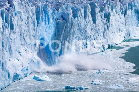 Glacial ice calving. Stock Image ~ Royalty Free #222034891