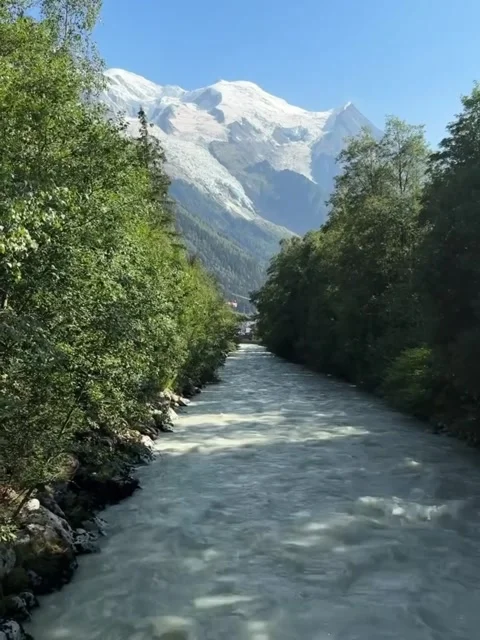 Glacial River and Alpine Resort Town Video stock 340870308