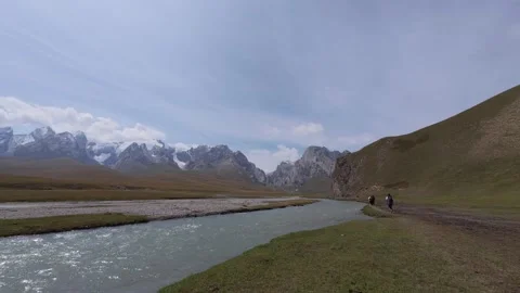 Glacial river and snow peaks, Naryn Region, Kyrgyzstan Video stock 347242853