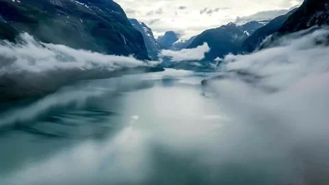 Glacial River Valley Mist and Icebergs Aerial View Stock Footage 308341053