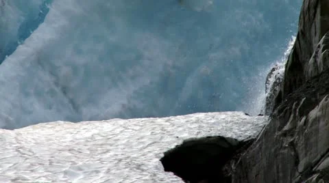 Glacial Side Chute Waterfall and Rock Wall Stock Footage 11524882