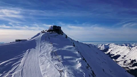 Glacier 3000 with cable car station and Peak Walk suspension bridge. Stock Footage 303444367