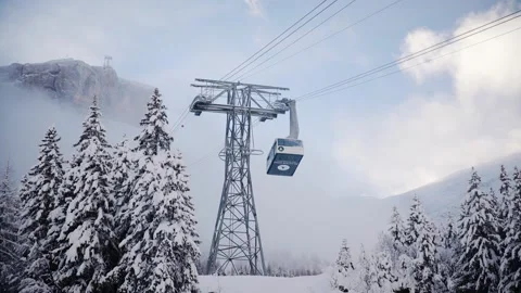 Glacier 3000: The ski slopes and lift on the glacier. December 2021, Col du Stock Footage 224537029